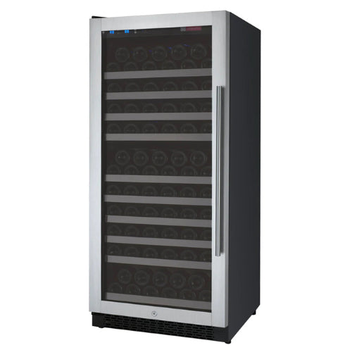 Stainless steel single zone wine refrigerator by Allavino featuring UV-protected glass, soft blue lighting, and sleek wood-accented shelving in a modern build.

